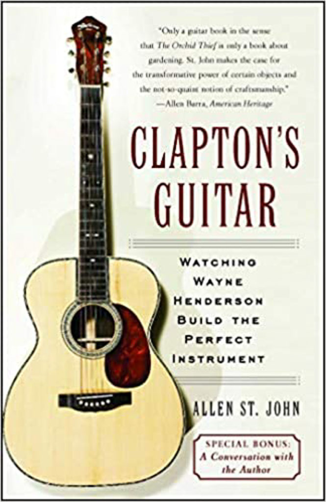 The cover of Clapton's Guitar shows a Wayne Henderson guitar upright beside the title text.