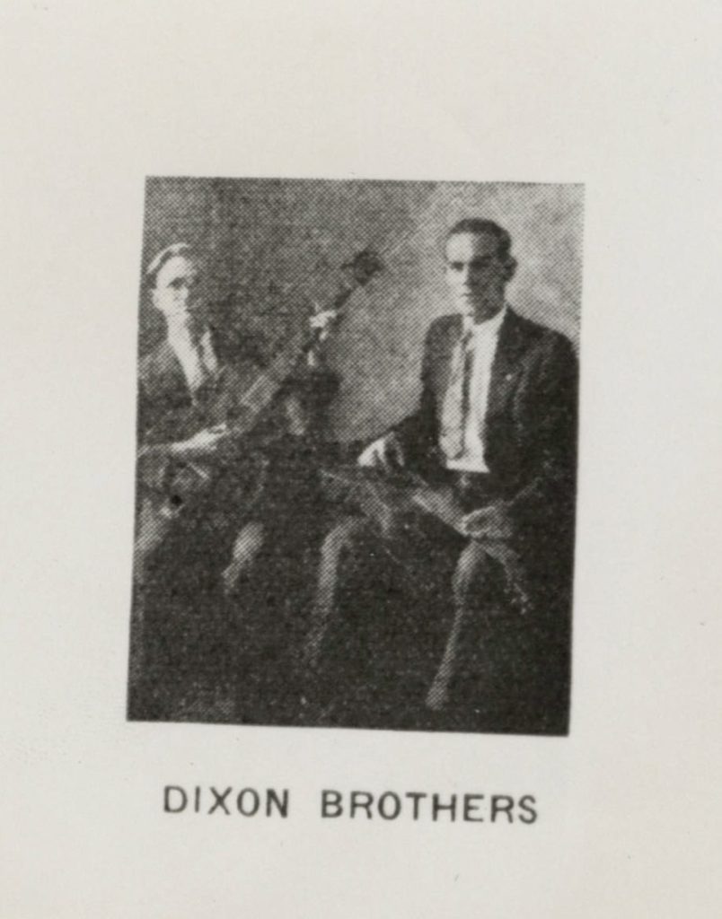 B&W photograph of Dixon Brothers holding their instruments