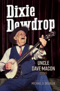 Cover image of Dixie Dewdrop showing title and Uncle Dave Macon playing the banjo.