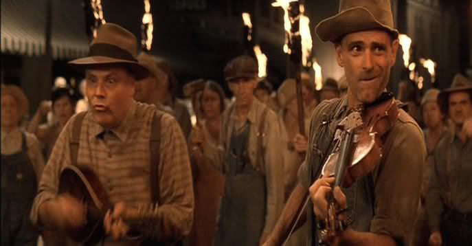 Still from the movie O Brother Where Are Thou? showing two old-time musicians (Ed Snodderly on fiddle)