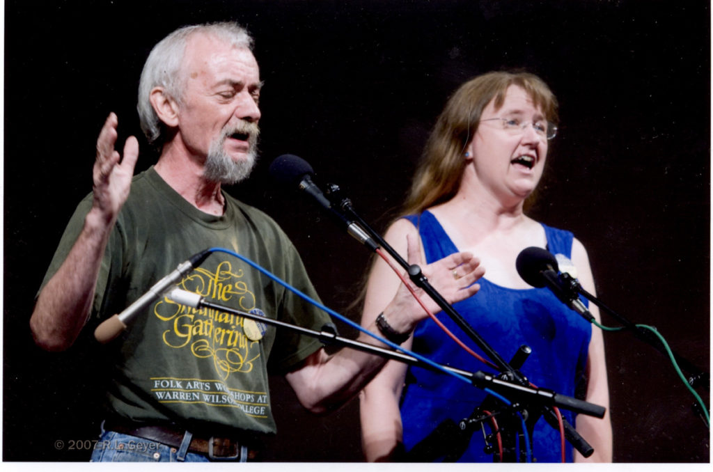 Jack Beck and Wendy Welch singing together on stage
