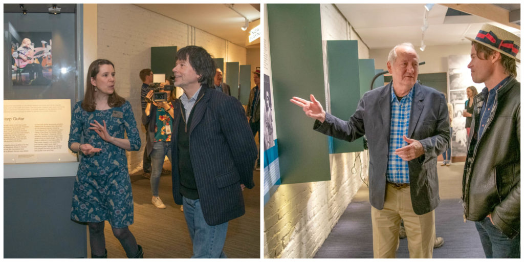 Left: Rene Rodgers talks to Ken Burns in front of one of the museum exhibits; Right: Dayton Duncan points out something on one of the museum exhibit panels to Ketch Secor.