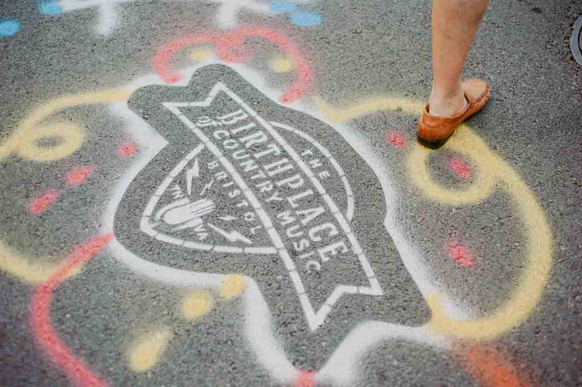 Artistic renditions of the BCM logo on the streets during Bristol Rhythm & Roots Reunion