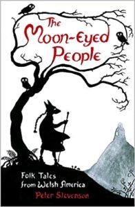 Book cover in white with black cartoonish images of a tree with no leaves with an owl resting on a branch. Below the tree is what appears to be a girl with a long braid holding a staff. The girl's head is that of a wolf. She is staring into the distance at a mountain in the background.