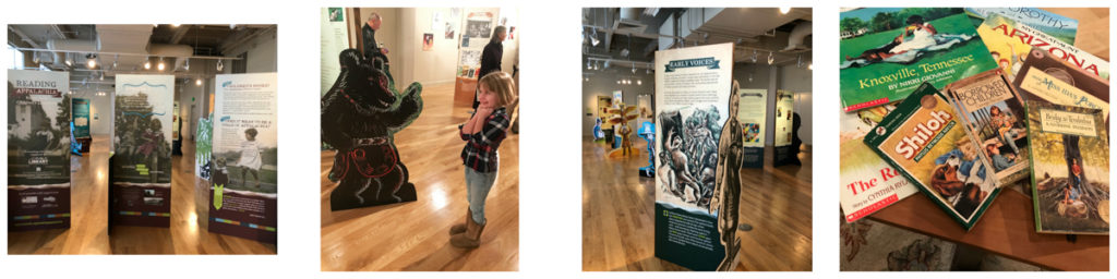Four images of the Reading Appalachia exhibit:
Far left: The opening panels bearing the exhibit's name and images of children in Appalachia.
Middle left: A little girl looking with delight on one of the life-size character cutouts: a bear!
Middle right: A long view of the gallery showing many of the exhibit panels and character cut-outs.
Right: A pile of books in the Story Corner of the exhibit.