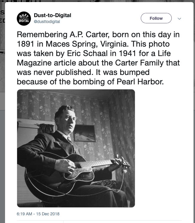Screenshot of Dust-to-Digital's tweet on A.P.'s birthday in 2018, noting the Life photoshoot and with a black-and-white photograph of A.P. from that shoot. He sits holding his guitar in a room with flowered wallpaper.