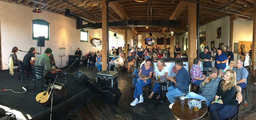 Audience upstairs at Studio Brew listening to Wise Old River.