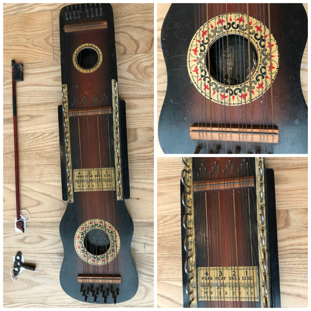 Various views and details of the ukelin, especially focused in on the lovely gold, red, and black decorative pattern around the bottom sound hole and the chording info on the wide neck..