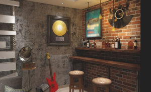 A view of the bar at The Sessions Hotel in Historic Downtown Bristol, Virginia-Tennessee depicting bar stools at a bar with a phonograph, guitar, and amplifier.