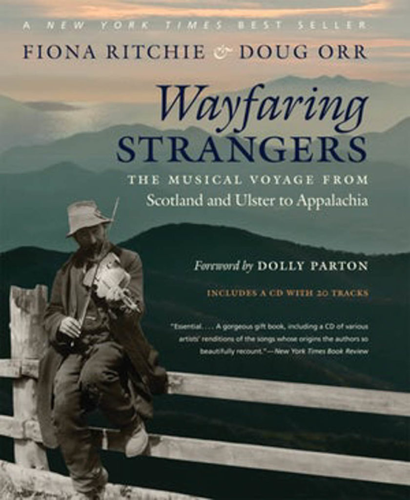 The cover of Wayfaring Strangers shows hill upon hill of the Appalachian Mountains, with a superimposed photograph of a Scottish fiddler to the left side of the cover image.