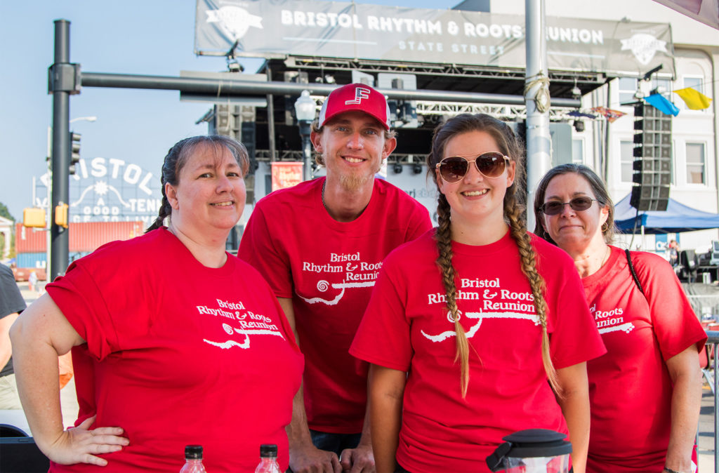 Photo of a group of festival volunteers wearing Bristol Rhythm & Roots Reunion t-shirts.