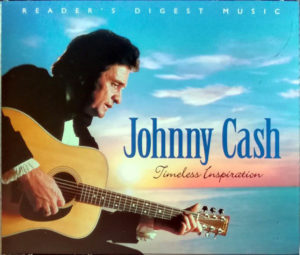 The Timeless Inspiration album cover shows an ocean and sunrise/sunset view with Johnny Cash's image in the foreground. He is in profile holding his guitar and wearing a black jacket over a white long-sleeved shirt.