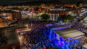 An aerial photo, taken at night time, showing the large crowd gathered at the Piedmont Stage for The Red Clay Strays during Bristol Rhythm & Roots Reunion 2024.