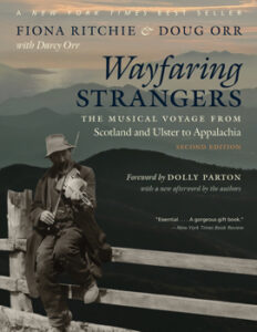 book cover that shows a fiddler sitting on a fence in front of a mountain background